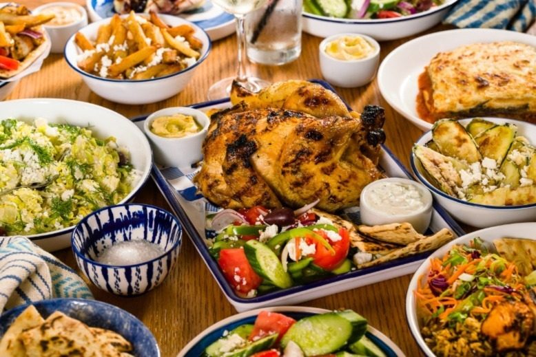 A table full of Greek food.