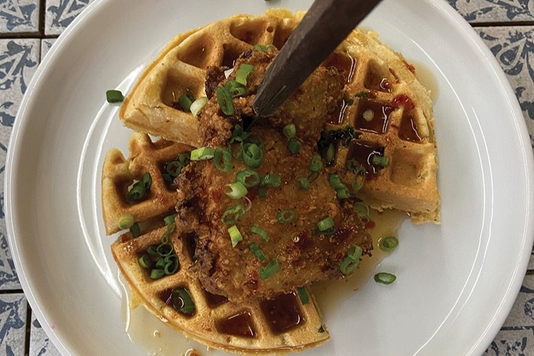 Fried chicken on a sourdough-scallion waffle with spicy maple syrup at HoopHouse in Bordentown.