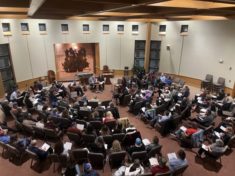 Photo of congregants at prayer vigil in synagogue