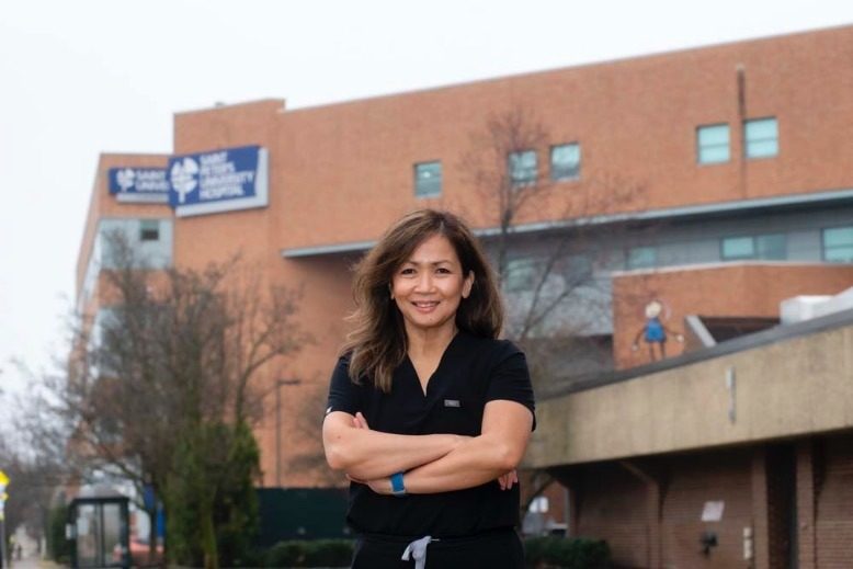 Metabolic nurse Karen Nunn stands outside St. Peter’s University Hospital in New Brunswick.