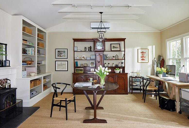Sally Ross's light-filled home office features built-ins and a neutral color palette.