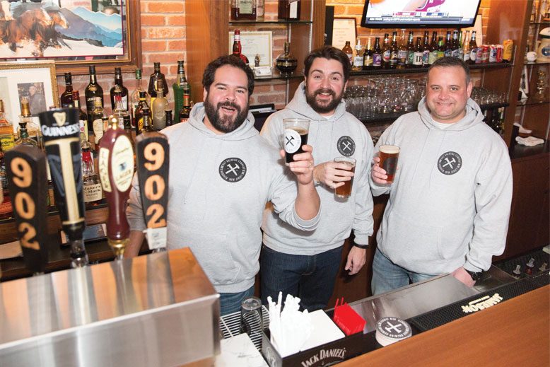 The 902 Brewing Co. crew enjoys their beers.