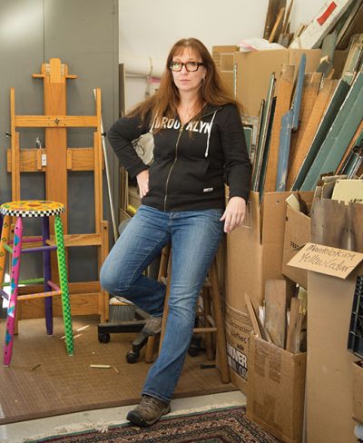 Laura Petrovich-Cheney in the Asbury Park Studio where she creates quilt-like works from the remnants of Hurricane Sandy.