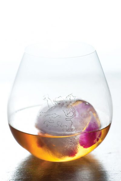 Tamasaki single-malt Japanese whiskey, served over an organic orchid encased in a sphere of ice at Le Malt.