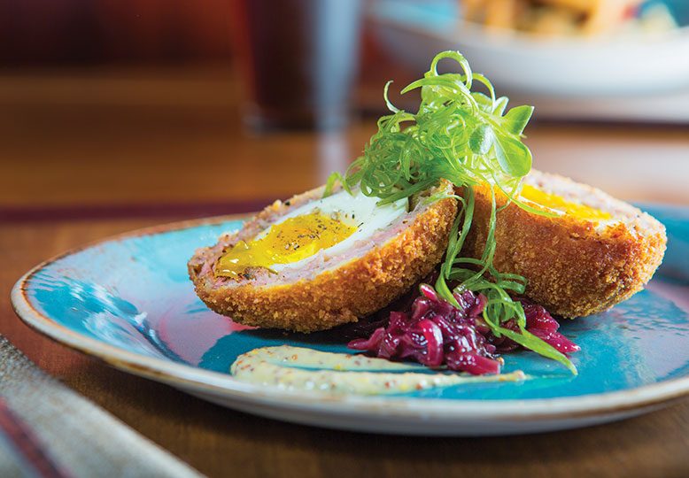 The Scotch egg, encased in ground pork and panko bread crumbs.
