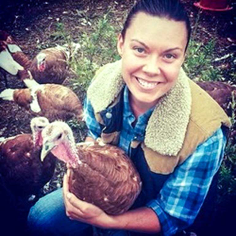 Jessica Isbrecht with organic turkeys from her Green Duchess Farm.