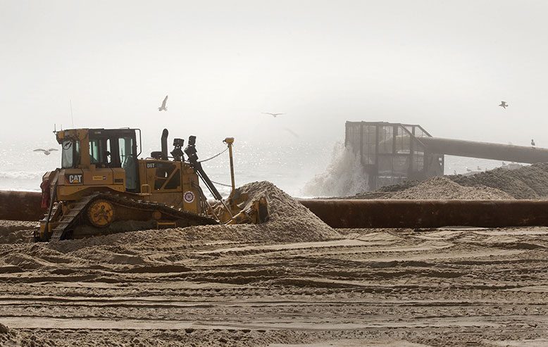 Heavy machinery replenishes the beach in Ship Bottom on Long Beach Island in May 2015.