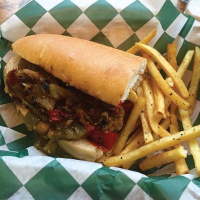 The Ole Saw-Seege with Italian sausage, sautéed peppers and onions.