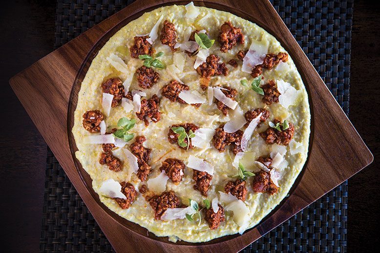 B2 Bistro’s unique polenta—the toppings vary daily, this one featuring pork ragù, micro-basil and shavings of pecorino.