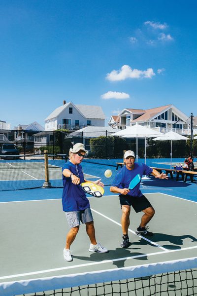 Pickleball regulars Kim Jackson, left, and Lew Storb put on a display of teamwork at the Stone Harbor town courts introduced last summer.