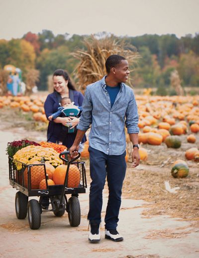 Anthony Alabi and Cristina Cerbelli of North Brunswick, take 3-month-old Leo for an outing.