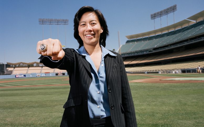 Kim Ng shows off the World Series ring she won with the Yankees in 1998. Today, Ng is baseball's highest ranking female executive.