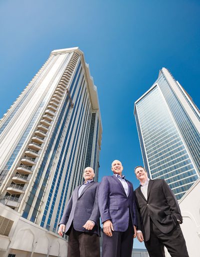 Admiring the towers of the Hard Rock Hotel & Casino are, from left, developers Jack Morris and Joe Jingoli and Matt Harkness, president of Hard Rock Atlantic City.