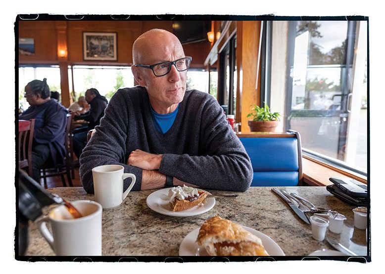 Dan Barry, at Manny’s Texas Weiners in Union, says everything about his decade writing the This Land column was “invigorating” except the travel.