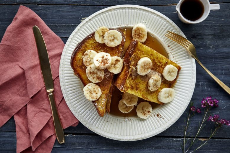 French toast topped with banana slices and syrup at Sabrina’s Café in Collingswood.