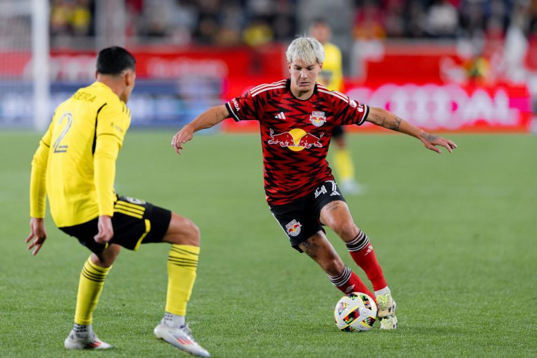 Chatham's John "JMi" Tolkin of the Red Bulls dribbling past a defender