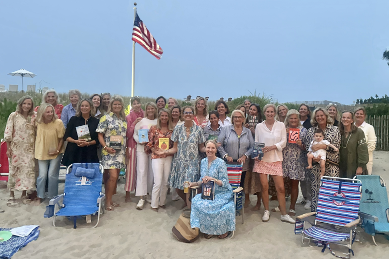 Julie McTernan hosts a book club gathering on the beach.