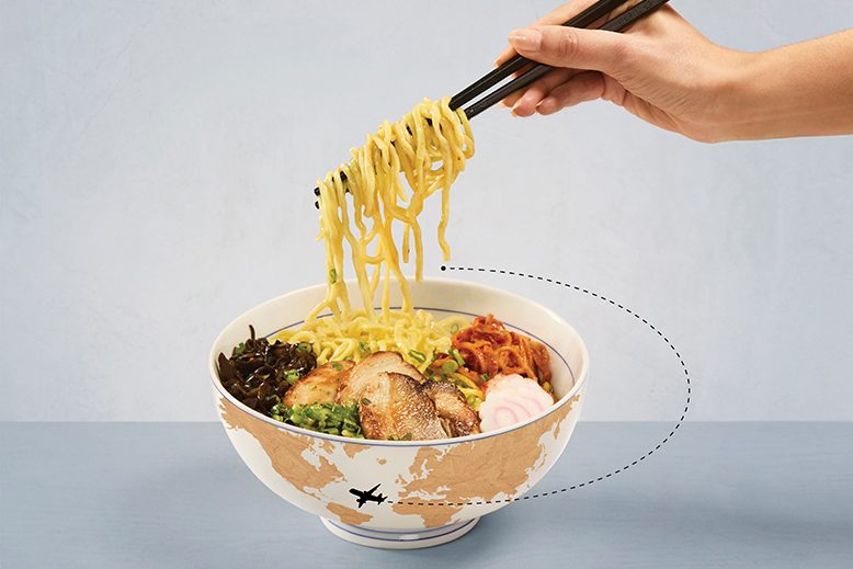 Bowl of ramen with illustration of plane flying around it
