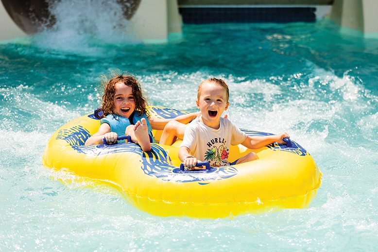 Two children on serpentine tube slide at Thundering Surf Waterpark in Beach Haven in LBI, NJ