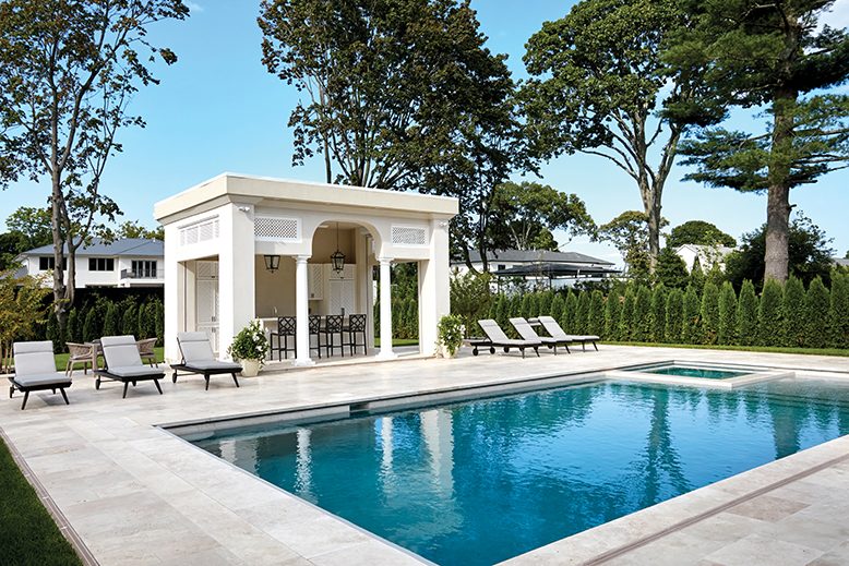 Pool and cabana area in backyard of home in Oakhurst, NJ