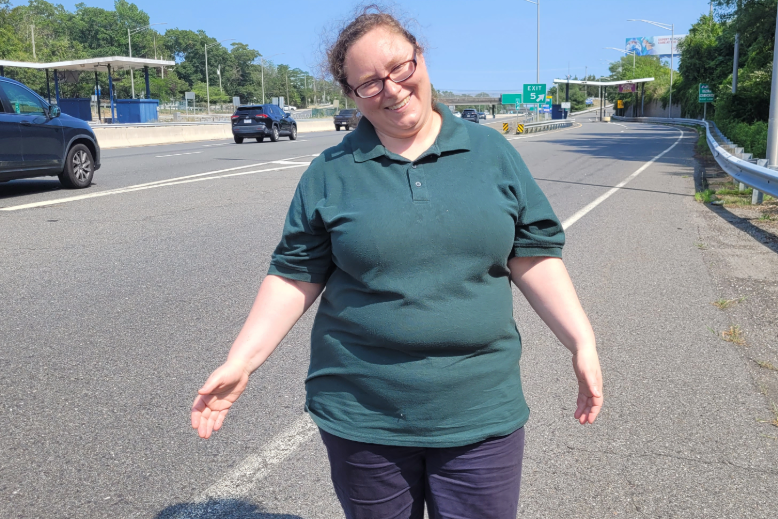 Former toll collector Allison E. Allen stands near Exit 5, where her toll booth once stood before all toll booths were removed.